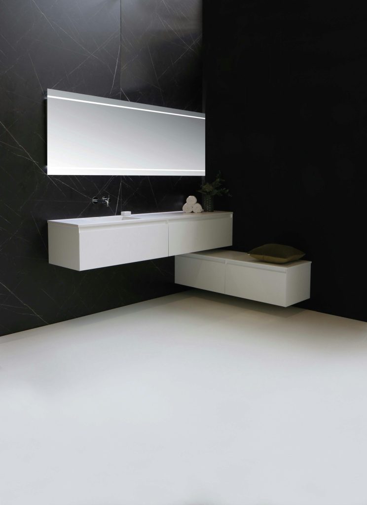 white ceramic sink with faucet